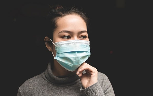 asian woman on mask