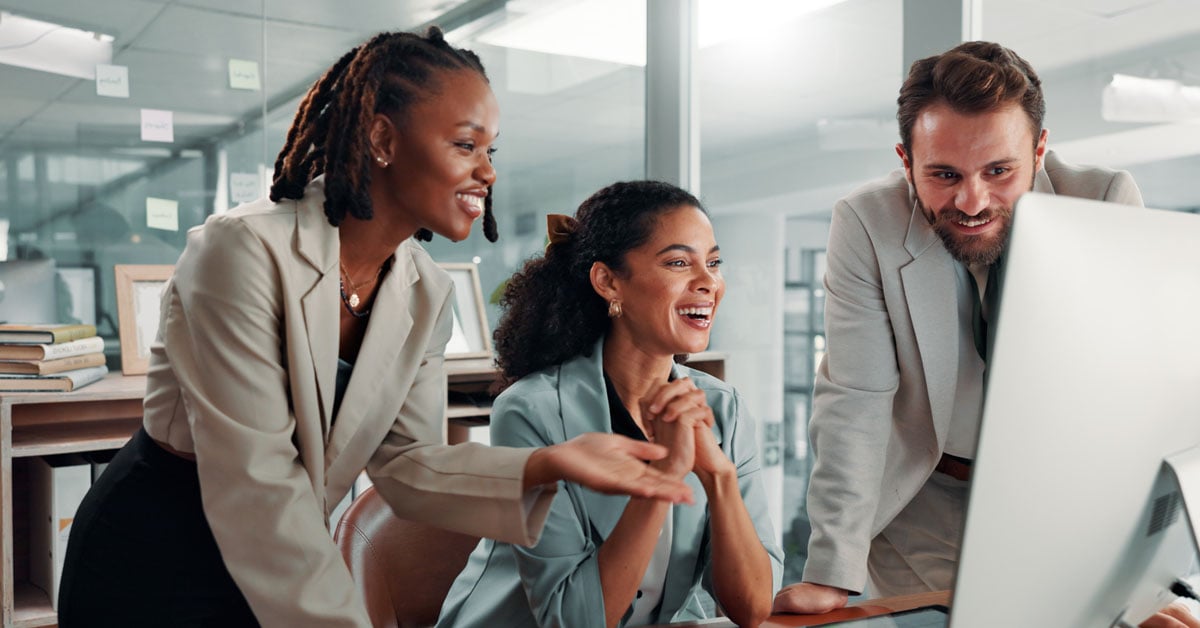 colleagues in an office brainstorming strategies for digital transformation in insurance